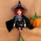 Velora sitting with a pumpkin (sold separately) 